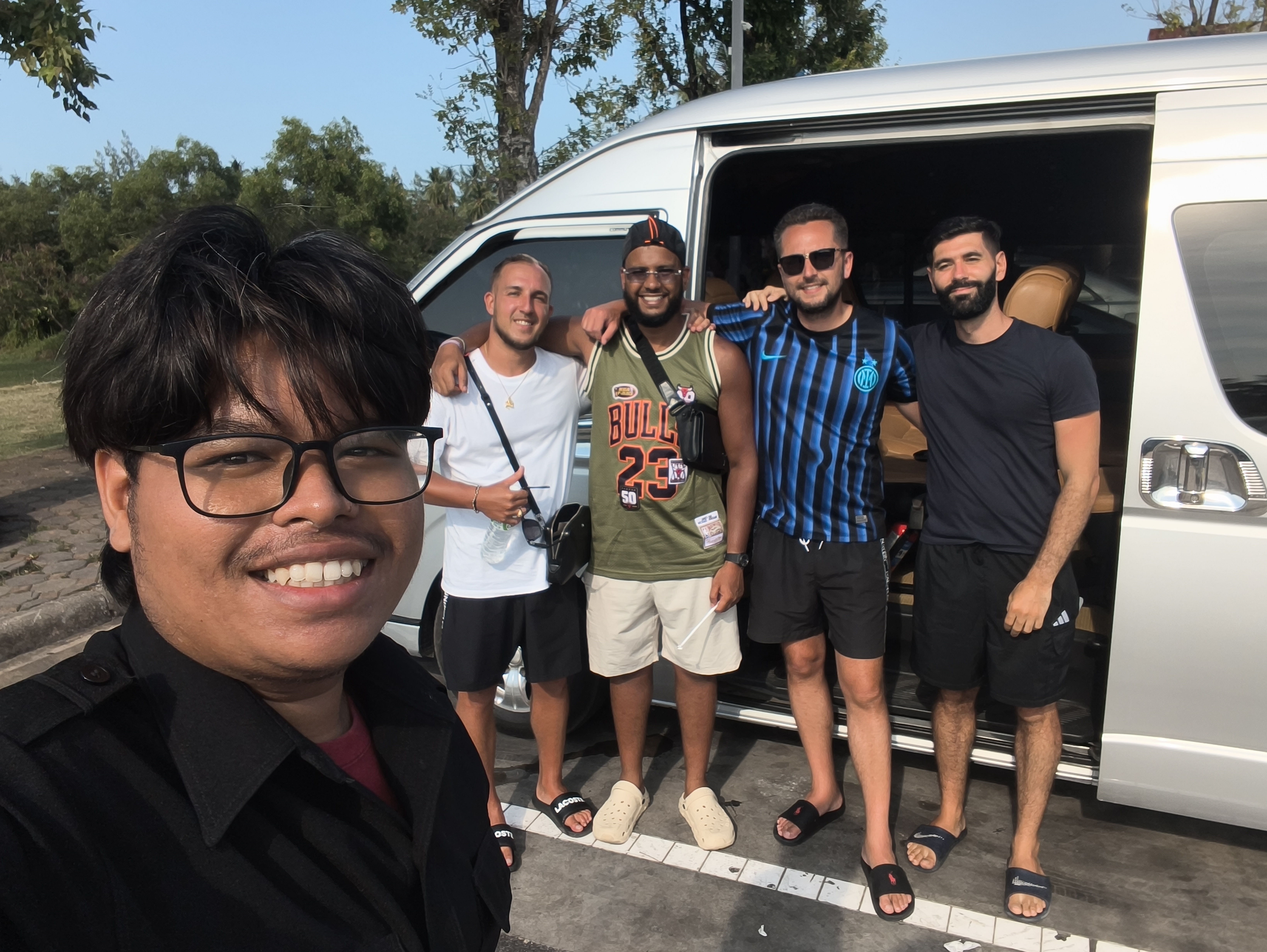 International guests with Sakkarin Transport van